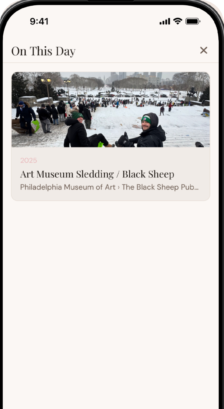 On This Day screen surfacing a memory from a year ago: Art Museum sledding in Philadelphia.